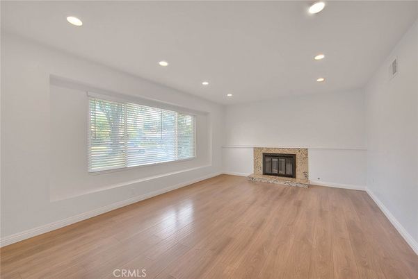 Empty room, Fireplace, Interior, Recessed Lighting, Wood Texture Flooring