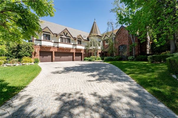 Attached, Backyard, Exterior, Facade, Brick Facade, Tudor Revival