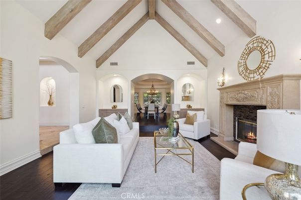Chandelier, Dining room, Fireplace, Interior, Living room, Pendant Lights, Recessed Lighting, Wooden Beams, Wood Texture Flooring