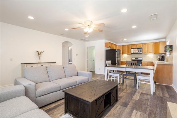 Dining room, Interior, Kitchen, Living room, Recessed Lighting, Stainless Steel Appliances, Wood Texture Flooring