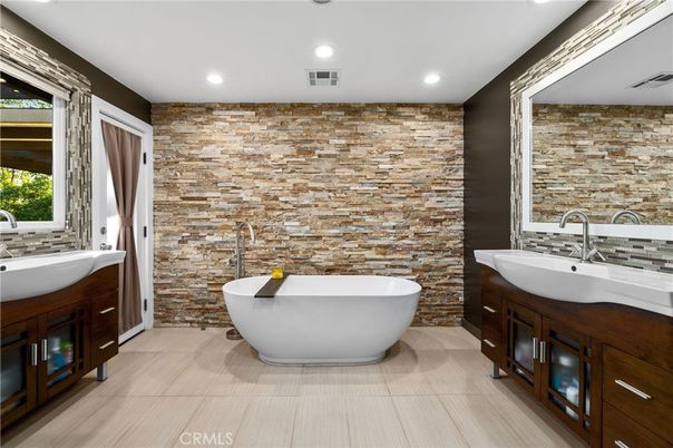 Bathroom, Dual Sink Vanities, Free Standing Baths, Interior, Recessed Lighting, Stone Walls