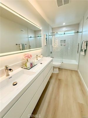 Bathroom, Dual Sink Vanities, Glass Shower, Interior, Recessed Lighting, Wood Texture Flooring