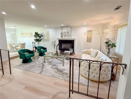 Chandelier, Dining room, Fireplace, Interior, Living room, Recessed Lighting, Wood Texture Flooring