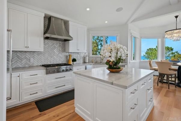Chandelier, Dining room, Interior, Kitchen, Recessed Lighting, Stainless Steel Appliances, Wood Texture Flooring