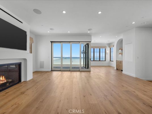 Empty room, Fireplace, Interior, Recessed Lighting, Water, Wood Texture Flooring