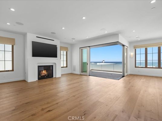 Empty room, Fireplace, Interior, Recessed Lighting, Water, Wood Texture Flooring