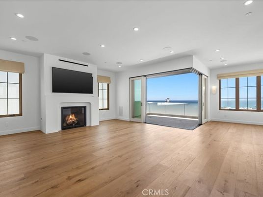 Empty room, Fireplace, Interior, Recessed Lighting, Water, Wood Texture Flooring