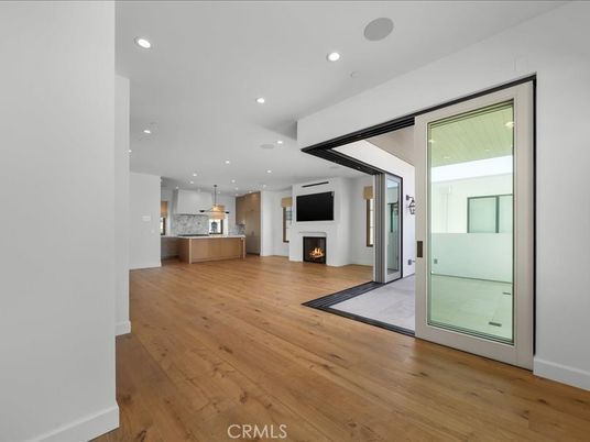Fireplace, Interior, Kitchen, Pendant Lights, Recessed Lighting, Stainless Steel Appliances, Wood Texture Flooring