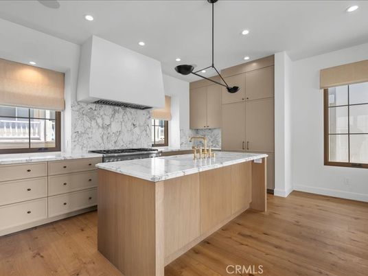 Interior, Kitchen, Marble Walls, Pendant Lights, Recessed Lighting, Wood Texture Flooring