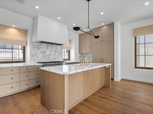 Interior, Kitchen, Marble Walls, Pendant Lights, Recessed Lighting, Wood Texture Flooring
