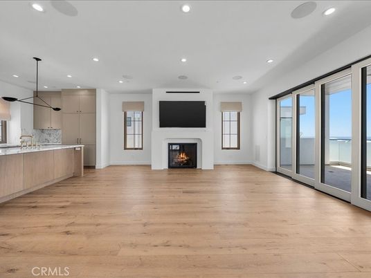 Empty room, Fireplace, Interior, Kitchen, Pendant Lights, Recessed Lighting, Wood Texture Flooring
