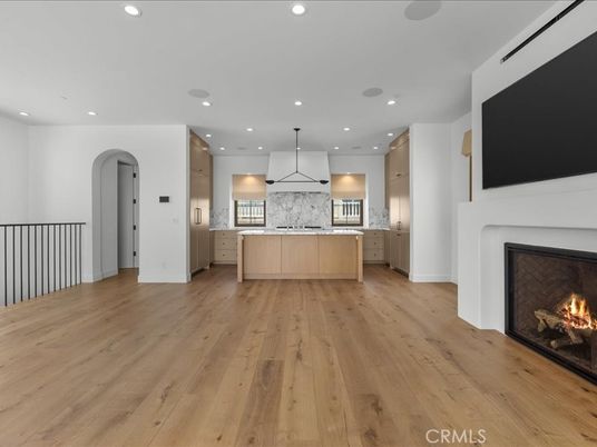 Fireplace, Interior, Kitchen, Marble Walls, Pendant Lights, Recessed Lighting, Wood Texture Flooring