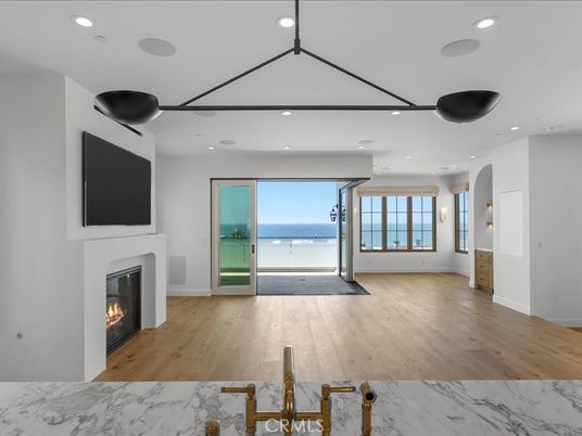 Empty room, Fireplace, Interior, Recessed Lighting, Water, Wood Texture Flooring