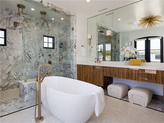 Bathroom, Dual Sink Vanities, Free Standing Baths, Glass Shower, Interior, Marble Walls, Recessed Lighting