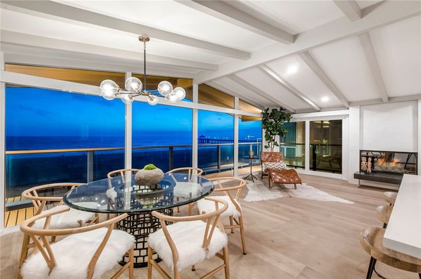 Dining room, Fireplace, Interior, Pendant Lights, Recessed Lighting, Water, Wood Texture Flooring