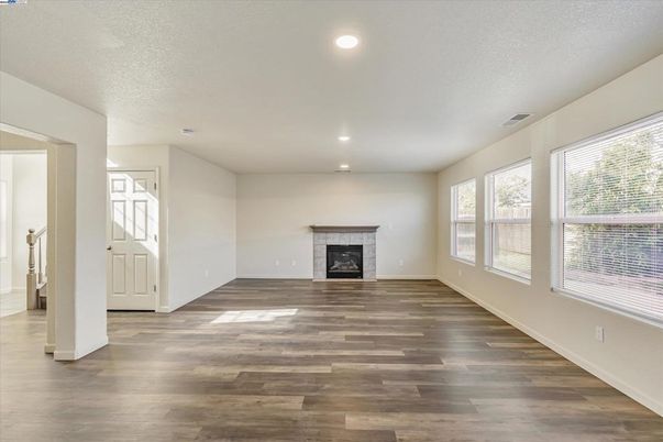 Empty room, Fireplace, Interior, Recessed Lighting, Wood Texture Flooring