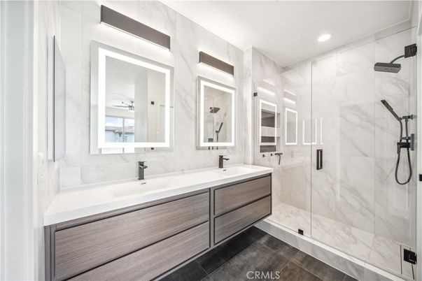 Bathroom, Dual Sink Vanities, Glass Shower, Interior, Marble Walls, Recessed Lighting
