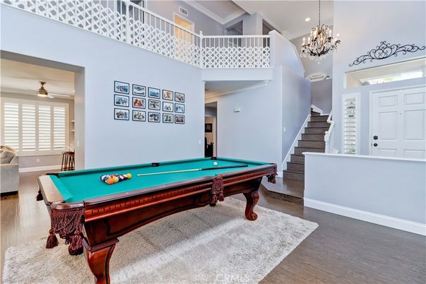 Billiard Table, Chandelier, Game Room, Interior, Recessed Lighting, Wood Texture Flooring
