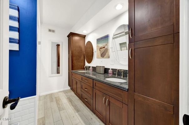 Bathroom, Dual Sink Vanities, Interior, Recessed Lighting, Wood Texture Flooring
