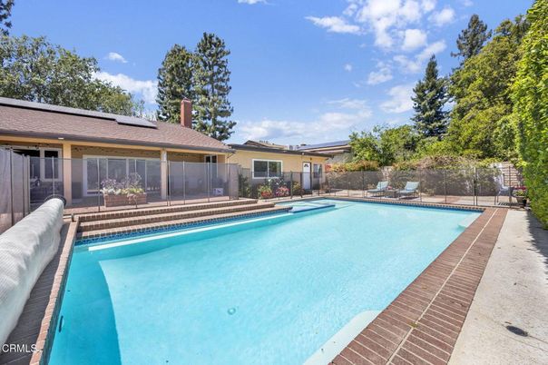 Exterior, Pool, Solar Panels