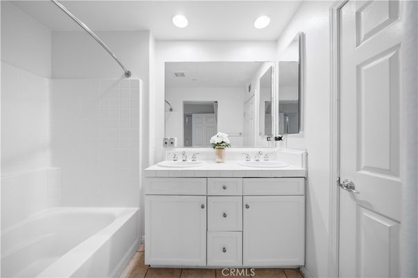 Bathroom, Dual Sink Vanities, Interior, Recessed Lighting, Tile Countertops