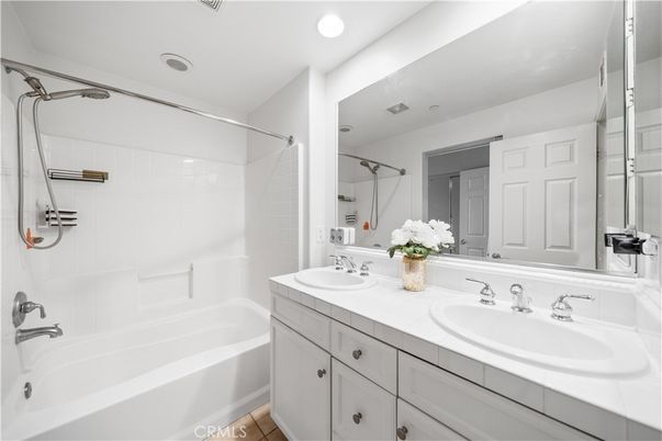 Bathroom, Dual Sink Vanities, Interior, Recessed Lighting, Tile Countertops