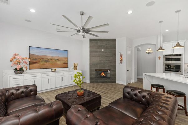 Home Theatre Room, Fireplace, Interior, Kitchen, Living room, Pendant Lights, Recessed Lighting, Stainless Steel Appliances, Wood Texture Flooring