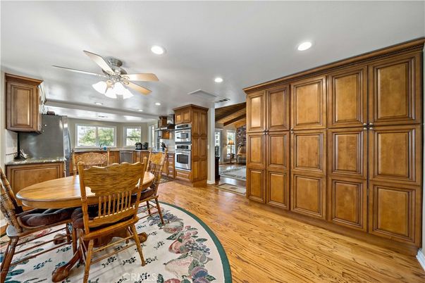 Dining room, Interior, Kitchen, Recessed Lighting, Stainless Steel Appliances, Wood Texture Flooring