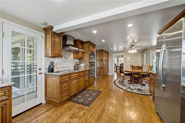 Dining room, Interior, Kitchen, Recessed Lighting, Stainless Steel Appliances, Wood Texture Flooring