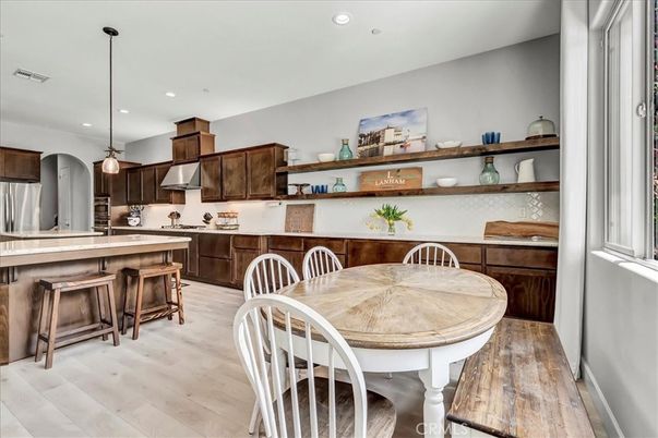 Dining room, Interior, Kitchen, Pendant Lights, Recessed Lighting, Stainless Steel Appliances, Wood Texture Flooring