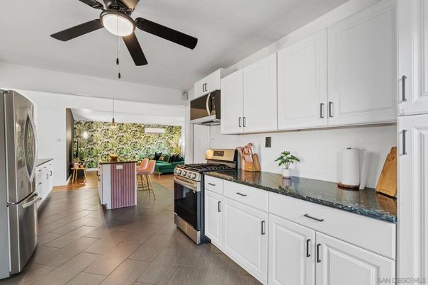 Dining room, Interior, Kitchen, Pendant Lights, Stainless Steel Appliances, Wood Texture Flooring