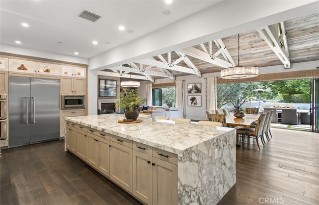 Chandelier, Dining room, Interior, Kitchen, Recessed Lighting, Stainless Steel Appliances, Wooden Beams, Wooden Ceilings, Wood Texture Flooring