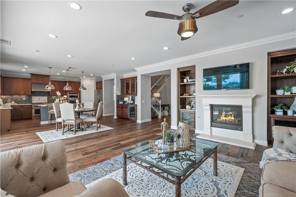 Dining room, Fireplace, Interior, Kitchen, Living room, Pendant Lights, Recessed Lighting, Stainless Steel Appliances, Wood Texture Flooring