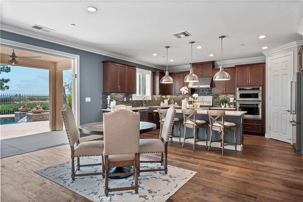 Dining room, Interior, Kitchen, Pendant Lights, Recessed Lighting, Stainless Steel Appliances, Wood Texture Flooring