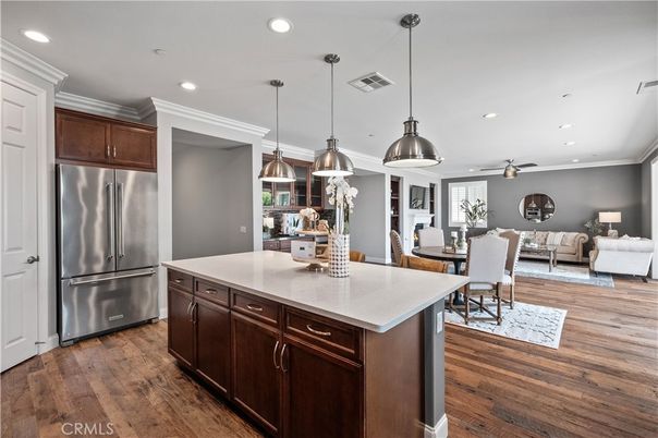 Dining room, Interior, Kitchen, Living room, Pendant Lights, Recessed Lighting, Stainless Steel Appliances, Wood Texture Flooring