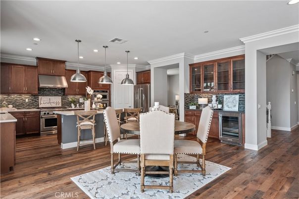 Dining room, Interior, Kitchen, Pendant Lights, Recessed Lighting, Stainless Steel Appliances, Wood Texture Flooring