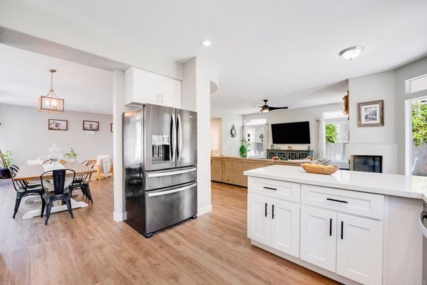 Dining room, Interior, Kitchen, Pendant Lights, Recessed Lighting, Stainless Steel Appliances, Wood Texture Flooring