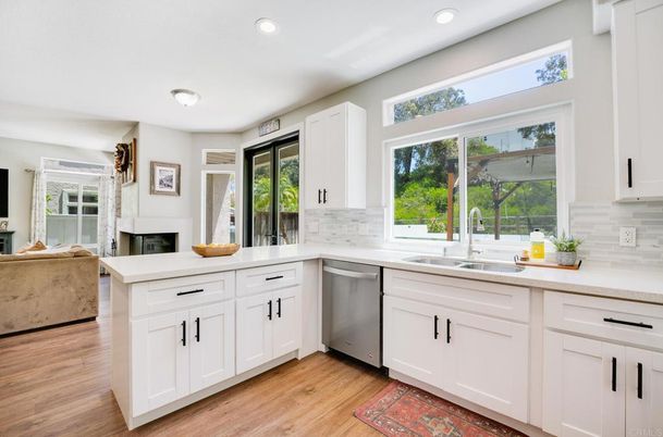 Fireplace, Interior, Kitchen, Recessed Lighting, Stainless Steel Appliances, Wood Texture Flooring