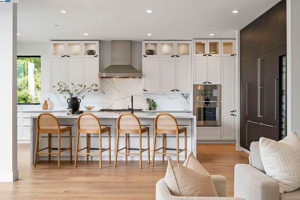 Interior, Kitchen, Marble Walls, Recessed Lighting, Stainless Steel Appliances, Wood Texture Flooring