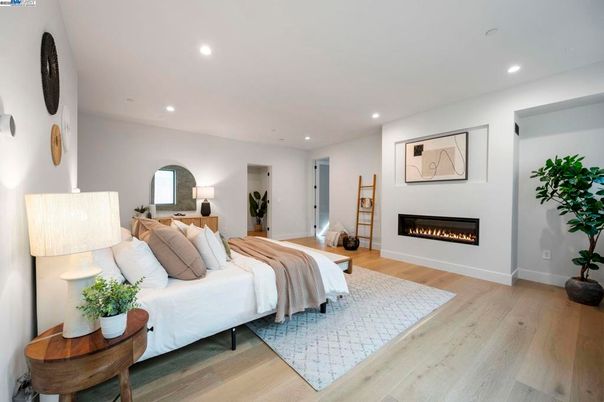 Bedroom, Fireplace, Interior, Recessed Lighting, Wood Texture Flooring