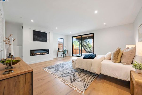Bedroom, Fireplace, Interior, Recessed Lighting, Wood Texture Flooring