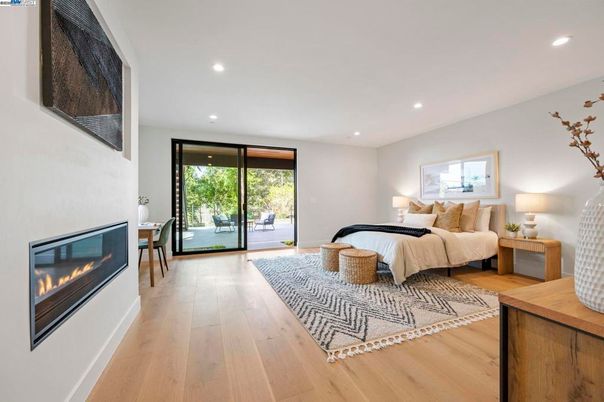 Bedroom, Fireplace, Interior, Recessed Lighting, Wood Texture Flooring