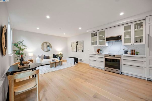 Interior, Kitchen, Living room, Marble Walls, Recessed Lighting, Stainless Steel Appliances, Wood Texture Flooring