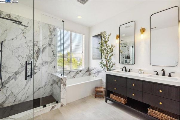 Bathroom, Dual Sink Vanities, Glass Shower, Interior, Marble Walls, Recessed Lighting