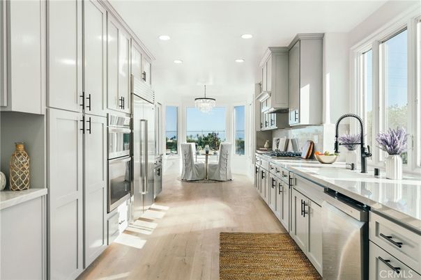 Chandelier, Dining room, Interior, Kitchen, Recessed Lighting, Stainless Steel Appliances, Wood Texture Flooring