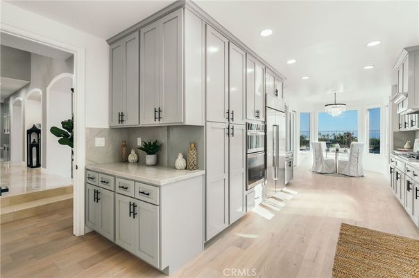 Chandelier, Dining room, Interior, Kitchen, Recessed Lighting, Stainless Steel Appliances, Wood Texture Flooring