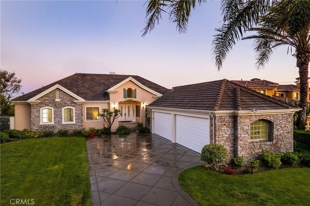 Attached, Backyard, Exterior, Facade, Brick Facade, Mediterranean