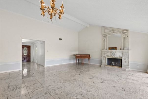 Chandelier, Empty room, Fireplace, Interior
