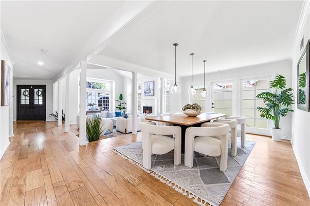 Dining room, Fireplace, Interior, Living room, Pendant Lights, Recessed Lighting, Wood Texture Flooring
