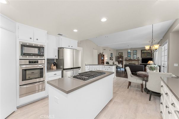 Chandelier, Dining room, Interior, Kitchen, Living room, Recessed Lighting, Stainless Steel Appliances